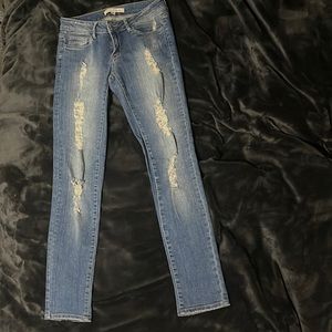 Y2K era low rise distressed stretch skinny jean. Size 27